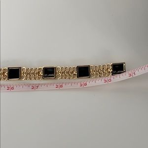 St. John Accessories - new St.John gold plated and black enameled belt St. John Accessories - new St.John gold plated and black enameled belt